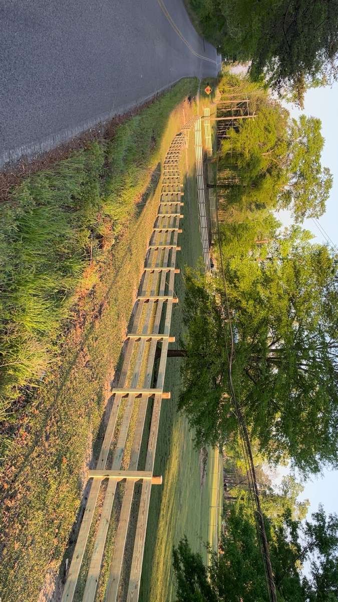 Board fence at sunset