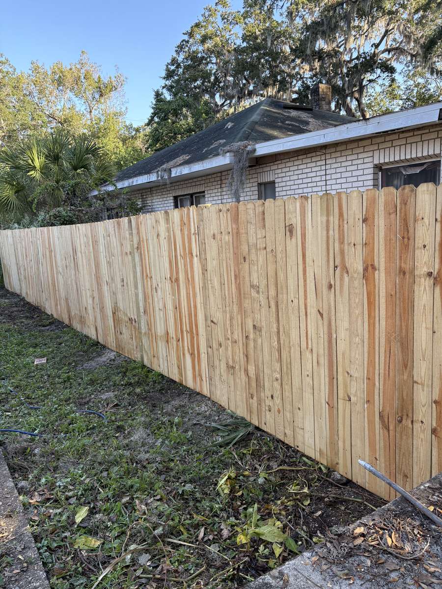 Wood privacy fence back yard