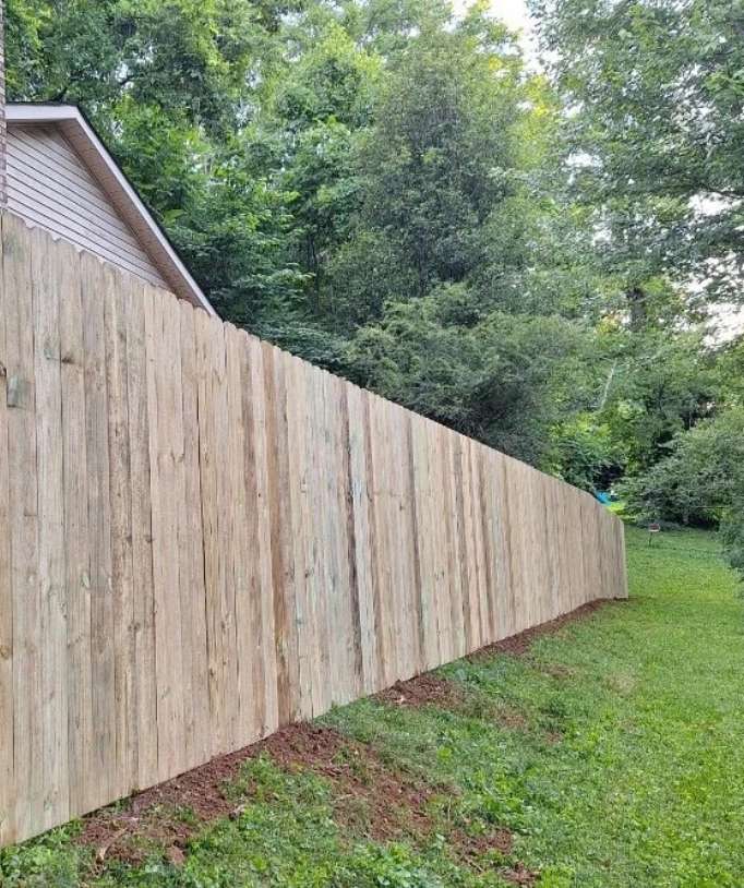 Horizontal privacy fence at sunset